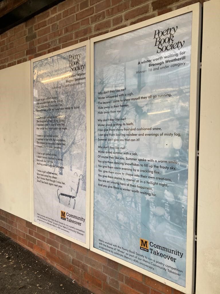 An image of poetry on display at a Metro station