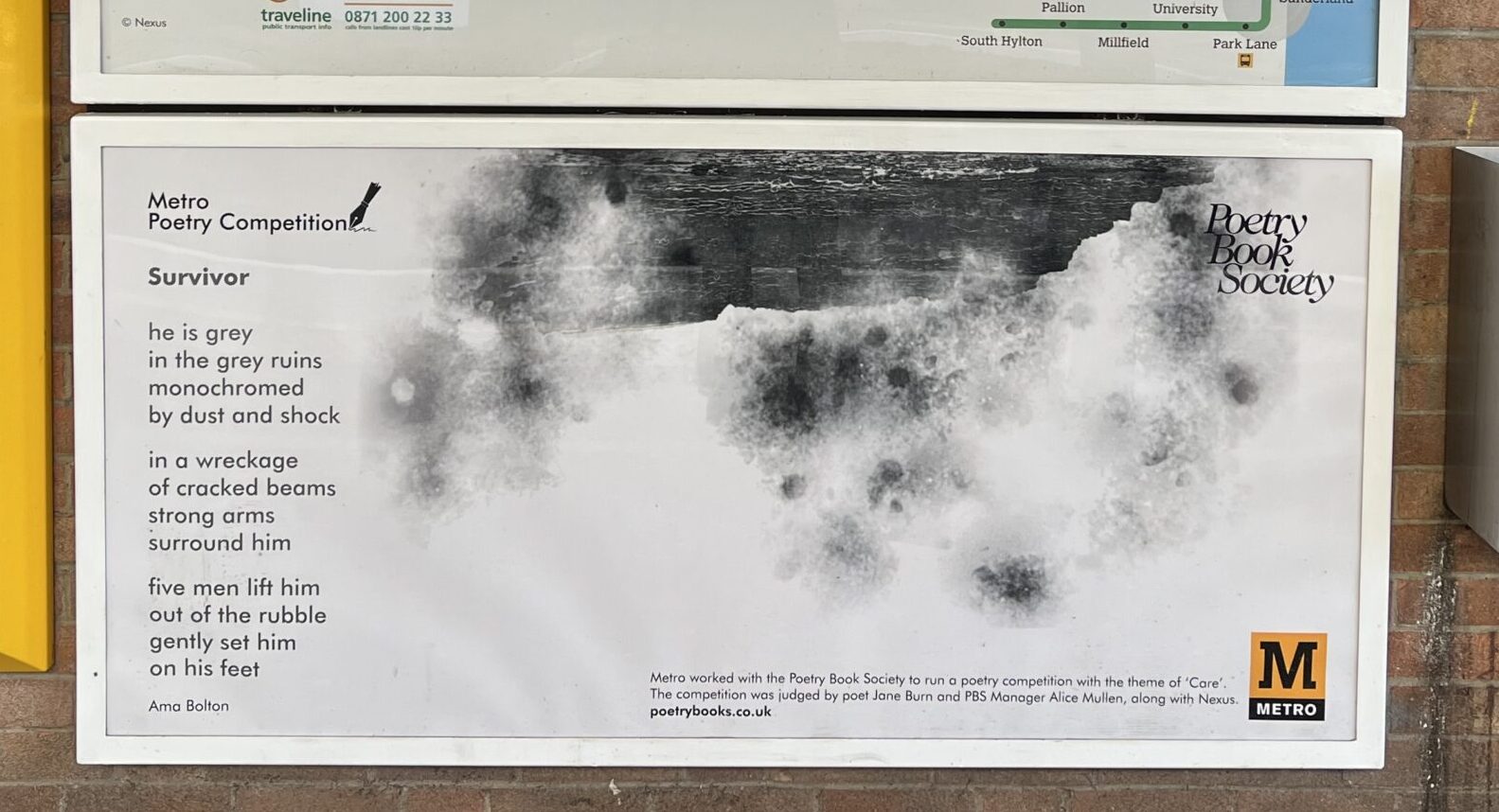 A Metro map and a framed poem on the platform at Longbenton Metro station